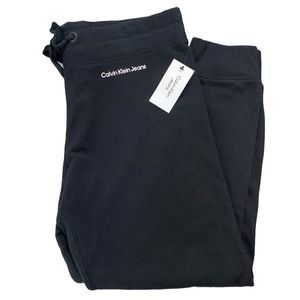 Calvin Klein Jeans solid black drawstring joggers with spellout logo size XL